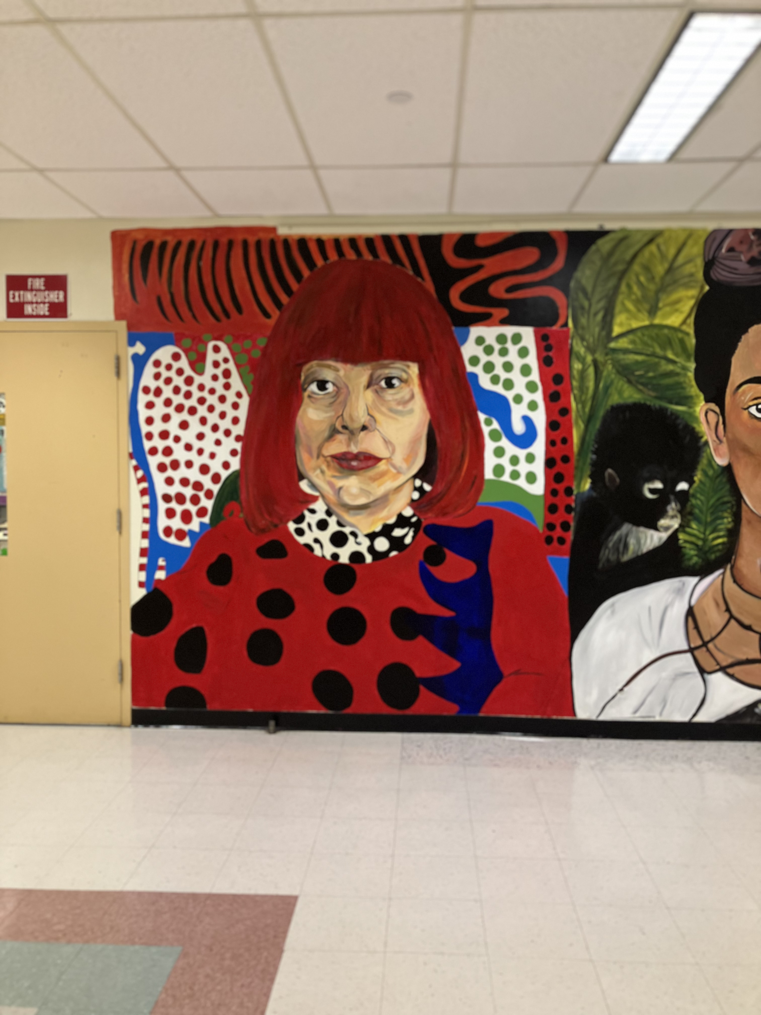 Yayoi Kusama as painted on the Wall of Artists mural at Western High School